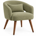 Chaise verte à dossier enveloppant et pieds marron